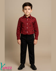 Boy wearing maroon formal shirt and black pants from Yumzz Baby Collection – premium kids formal outfit