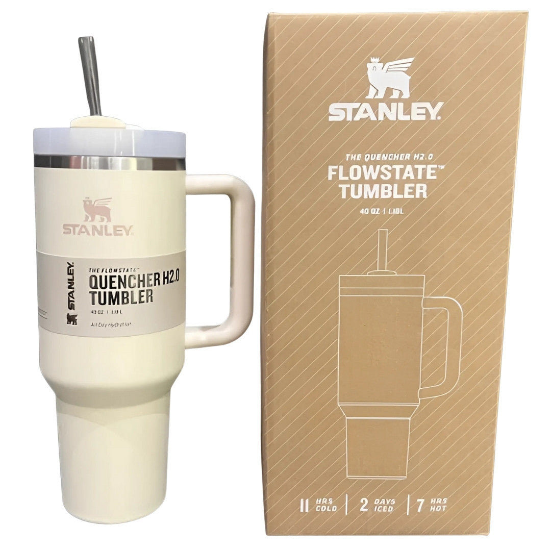 Stanley Quencher H2.0 FlowState tumbler with beige finish next to its packaging box.